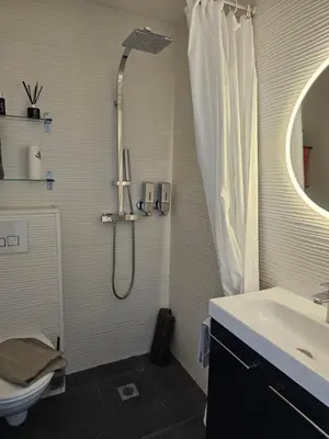 Salle de bains dans l'établissement Le Soleil
