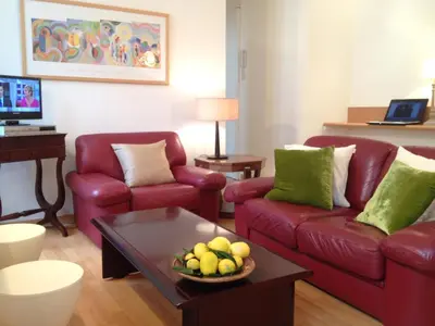Coin salon dans l'établissement Appartements 7 Florian