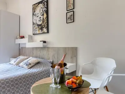 Un ou plusieurs lits dans un hébergement de l'établissement Cannes Croisette Concorde Miramar
