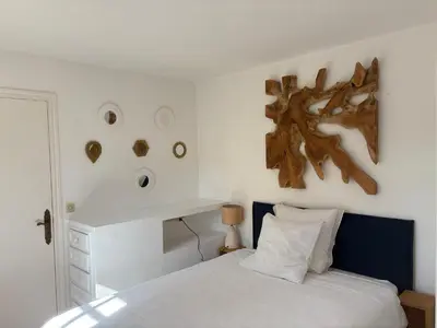 Un ou plusieurs lits dans un hébergement de l'établissement Magnifique Villa de prestige Antibes/Juan-les-Pins