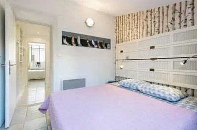 Un ou plusieurs lits dans un hébergement de l'établissement CANNES Festival Films Center, with 2 bedrooms and balcony