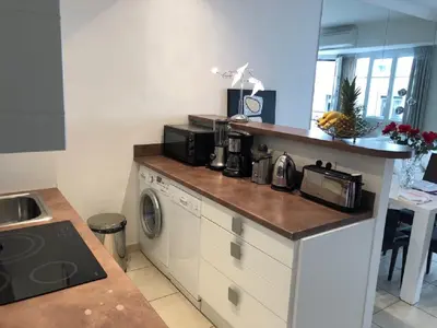 Cuisine ou kitchenette dans l'établissement Ô Palais des Iles Two Bedroom Cannes