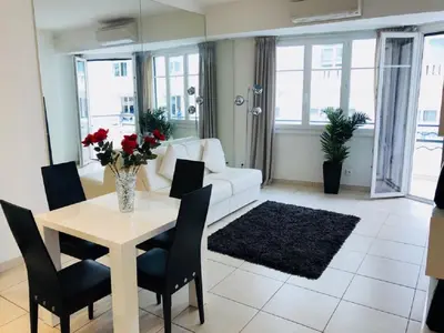 Coin salon dans l'établissement Ô Palais des Iles Two Bedroom Cannes