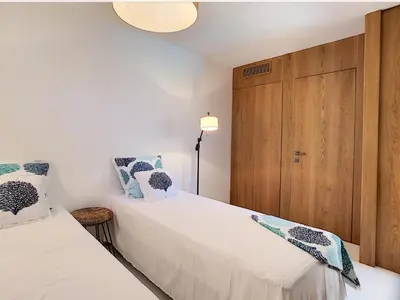 Un ou plusieurs lits dans un hébergement de l'établissement Villa Riviera