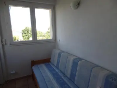 Coin salon dans l'établissement Villa L'Adret et sa piscine