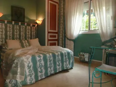 Un ou plusieurs lits dans un hébergement de l'établissement 9 chambres spa hamman sauna Piscine chauffée poss