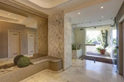 Coin salon dans l'établissement Appartement - villa Le Saint Georges avec superbe jardin et vue mer panoramique