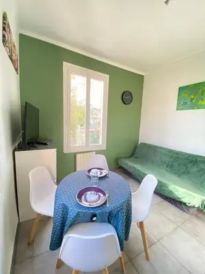Coin salon dans l'établissement Appartement PALOMA Proche Cannes