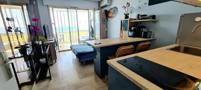 Cuisine ou kitchenette dans l'établissement Evasion Bleue