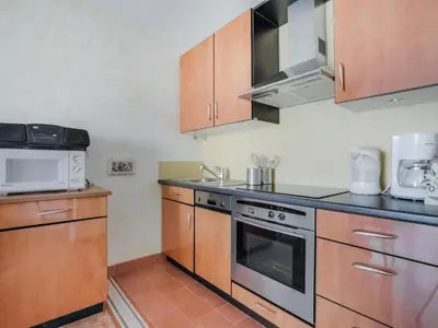 Cuisine ou kitchenette dans l'établissement Apartment Reine Astrid-3 by Interhome