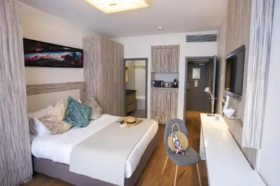 Un ou plusieurs lits dans un hébergement de l'établissement Eden Hotel & Spa