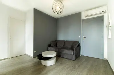 Coin salon dans l'établissement Florella République Apartment