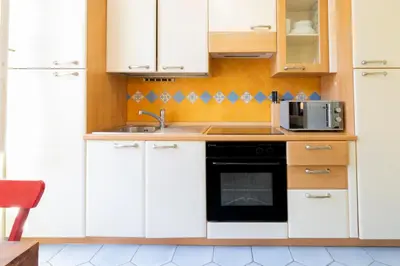Cuisine ou kitchenette dans l'établissement Place Amiral Barnaud