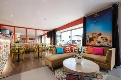 Coin salon dans l'établissement Hôtel Brimer Cannes