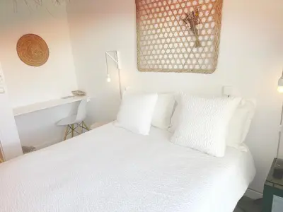 Un ou plusieurs lits dans un hébergement de l'établissement Blanc Sable Hôtel