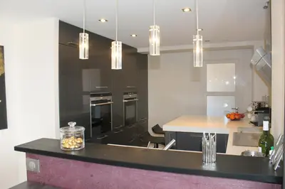 Cuisine ou kitchenette dans l'établissement Rooftop grande terrasse jacuzzi vue mer