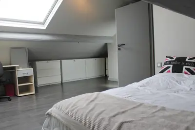 Un ou plusieurs lits dans un hébergement de l'établissement Rooftop grande terrasse jacuzzi vue mer