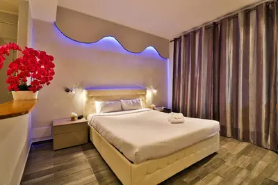 Un ou plusieurs lits dans un hébergement de l'établissement Hôtel Restaurant de la Mer