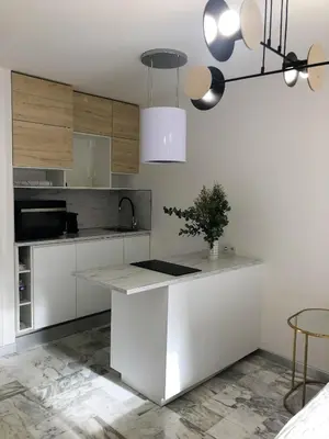 Cuisine ou kitchenette dans l'établissement Studio contemporain à Cannes avec terrasse et parking - 35 m²