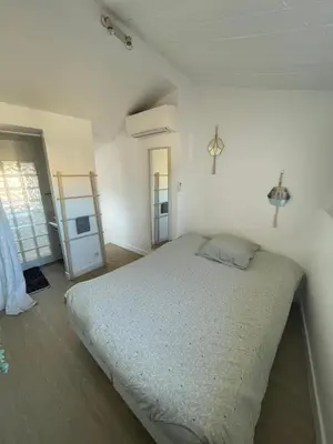 Un ou plusieurs lits dans un hébergement de l'établissement Magnifique Duplex Vieil Antibes