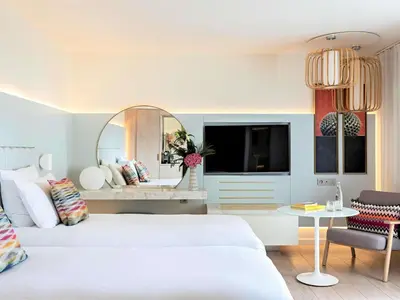 Un ou plusieurs lits dans un hébergement de l'établissement Croisette Beach Hotel Cannes - MGallery Collection