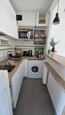 Cuisine ou kitchenette dans l'établissement Charmant petit studio à 100 m de la mer