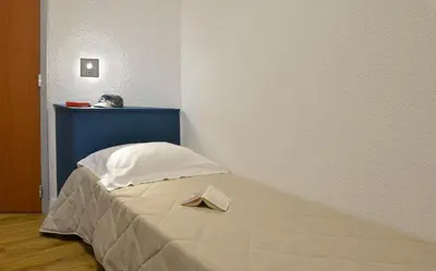 Un ou plusieurs lits dans un hébergement de l'établissement Residence Residéal Antibes