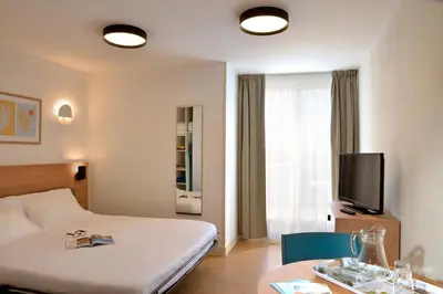 Un ou plusieurs lits dans un hébergement de l'établissement Residence Residéal Antibes