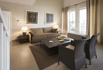 Coin salon dans l'établissement Cannes Croisette Prestige Apart'hotel
