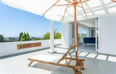 Balcon ou terrasse dans l'établissement The Gatsby Mansion