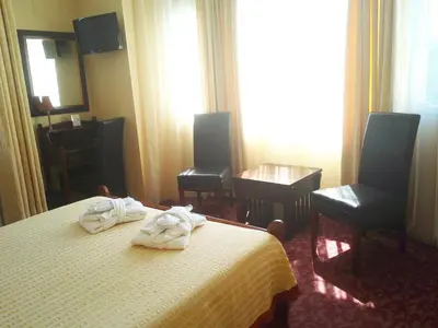 Un ou plusieurs lits dans un hébergement de l'établissement Hotel Alexandre III