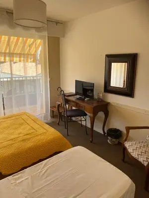Un ou plusieurs lits dans un hébergement de l'établissement Hôtel Restaurant Brasilia