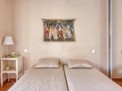 Un ou plusieurs lits dans un hébergement de l'établissement Apartment Les allées du Cap-3 by Interhome