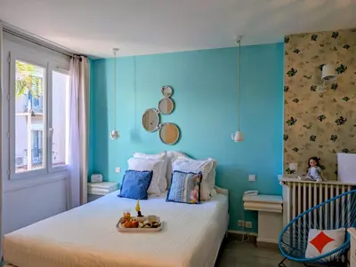 Un ou plusieurs lits dans un hébergement de l'établissement Hôtel Mademoiselle