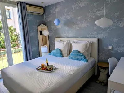Un ou plusieurs lits dans un hébergement de l'établissement Hôtel Mademoiselle
