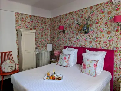 Un ou plusieurs lits dans un hébergement de l'établissement Hôtel Mademoiselle