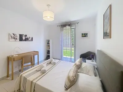 Un ou plusieurs lits dans un hébergement de l'établissement Appartement Danaé Antibes