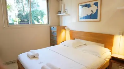 Un ou plusieurs lits dans un hébergement de l'établissement Proche Croisette, Studio Cosy by Palmazur