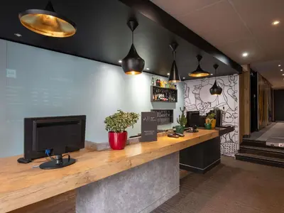 Télévision ou salle de divertissement dans l'établissement ibis Cannes Centre