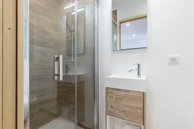Salle de bains dans l'établissement Le Clemenceau