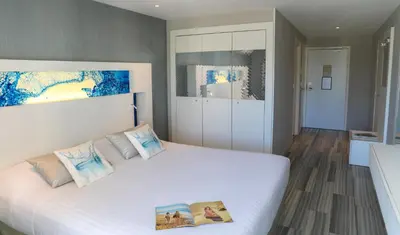 Un ou plusieurs lits dans un hébergement de l'établissement Hôtel Josse