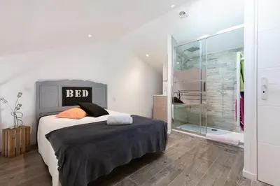 Un ou plusieurs lits dans un hébergement de l'établissement Atelier Duplex