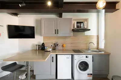 Cuisine ou kitchenette dans l'établissement Atelier Duplex