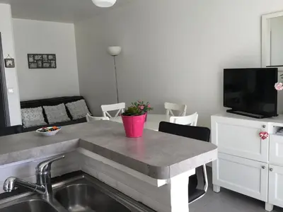 Télévision ou salle de divertissement dans l'établissement LE SAPHYR