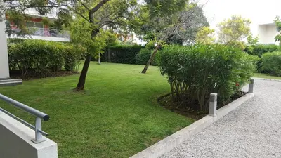 Jardin de l'établissement Appartement 2P et parking privé à 50m des plages.