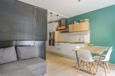 Cuisine ou kitchenette dans l'établissement Le Cocon Juanais - Welkeys