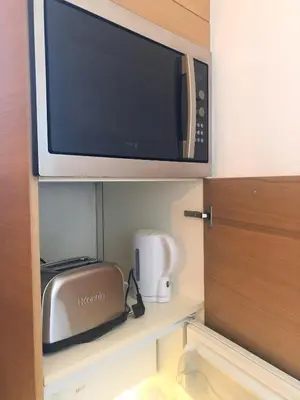 Télévision ou salle de divertissement dans l'établissement Studio Vieil Antibes - Saint Antoine