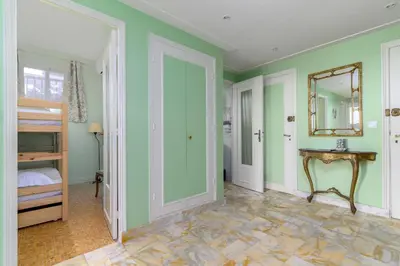 Un ou plusieurs lits dans un hébergement de l'établissement Appartement Bagatelle Exceptional location with stunning sea views
