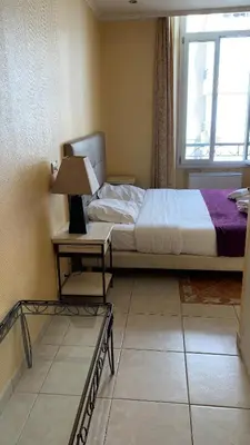 Un ou plusieurs lits dans un hébergement de l'établissement Village Croisette