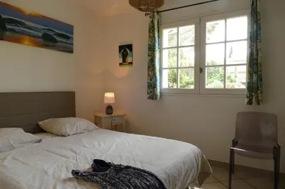 Un ou plusieurs lits dans un hébergement de l'établissement Villa Alessia